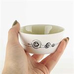 Small flared ceramic bowl with green interior