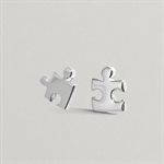 Puzzle Piece Stud Earrings in polished silver