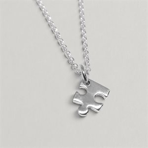 Pendentif Casse-tête en argent poli