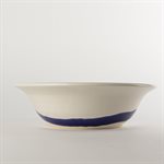 Wide rimmed plate in blue and white ceramic