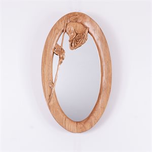 Miroir ovale en bois sculpté