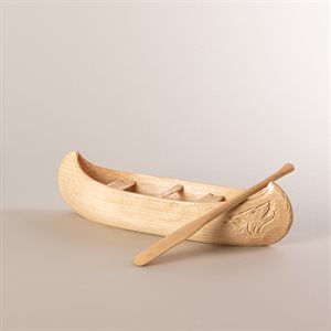 Miniature carved wooden canoe, wolf model
